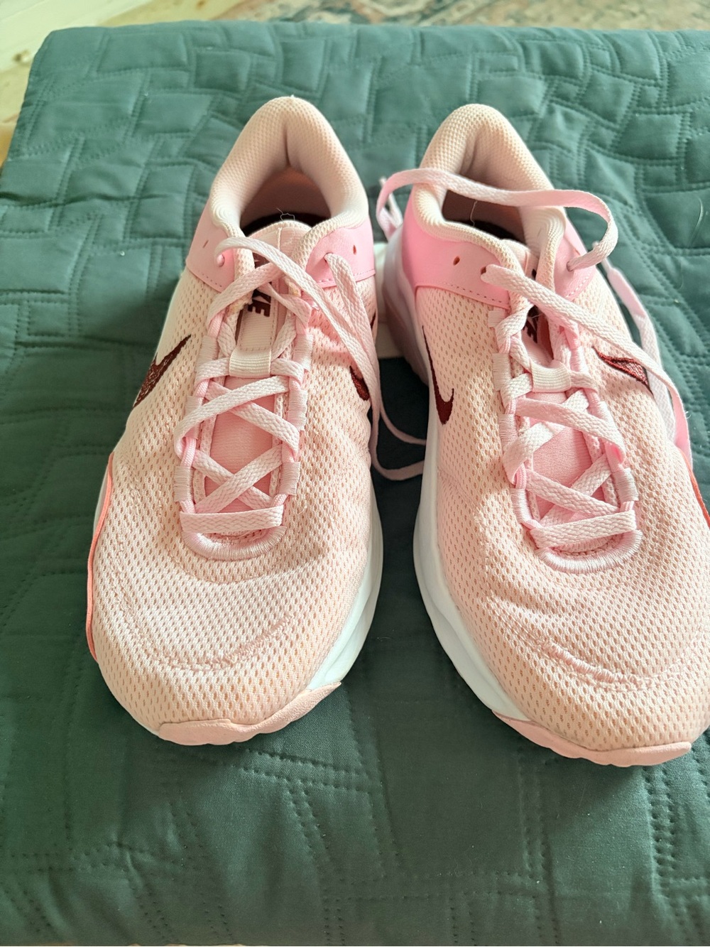 Pink Nike woman’s 9